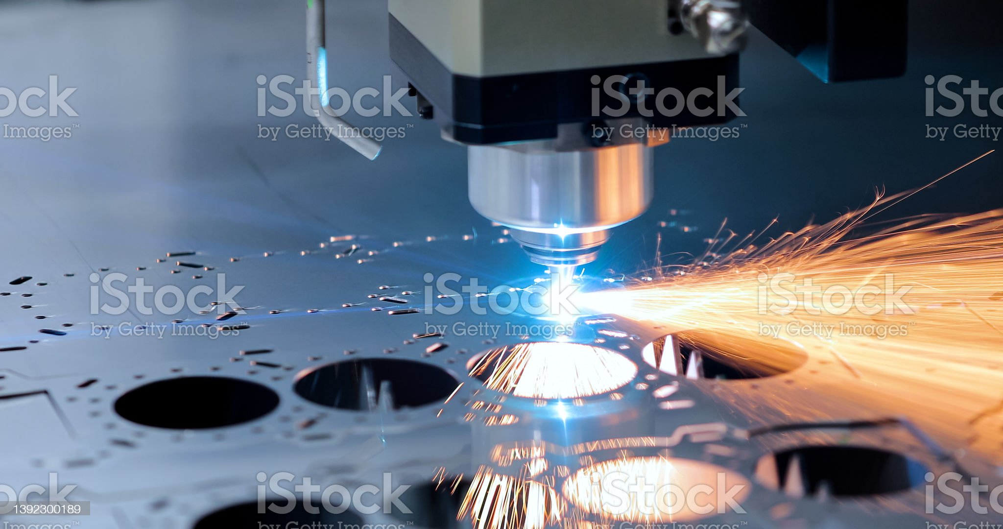 Cnc milling machine. Processing and laser cutting for metal in the industrial. Motion blur. Industrial exhibition of machine tools.